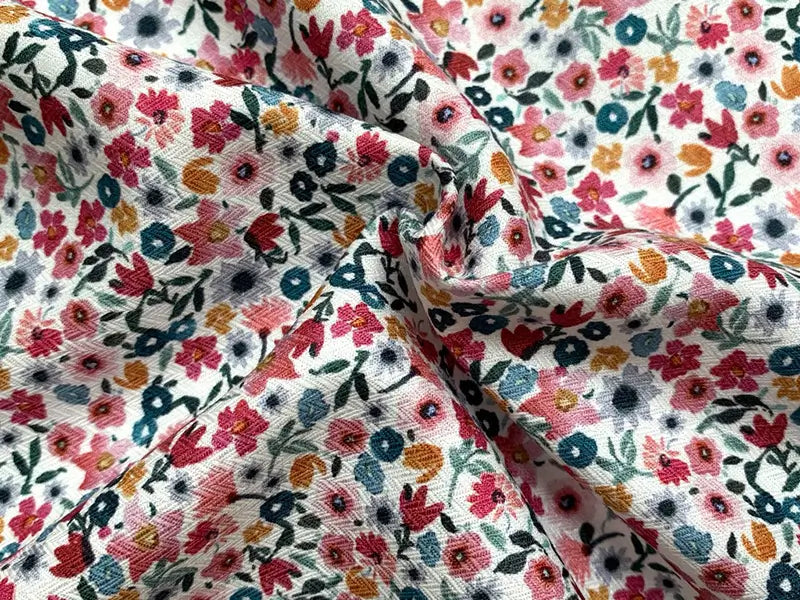 Baumwolle/Viskose Blumenmuster petrol pink blau