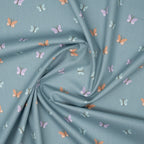 Bio Baumwolle Popeline Bunte Schmetterlinge Mint Lila Orange | Stoffwerk