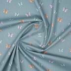 Bio Baumwolle Popeline Bunte Schmetterlinge Mint Lila Orange | Stoffwerk