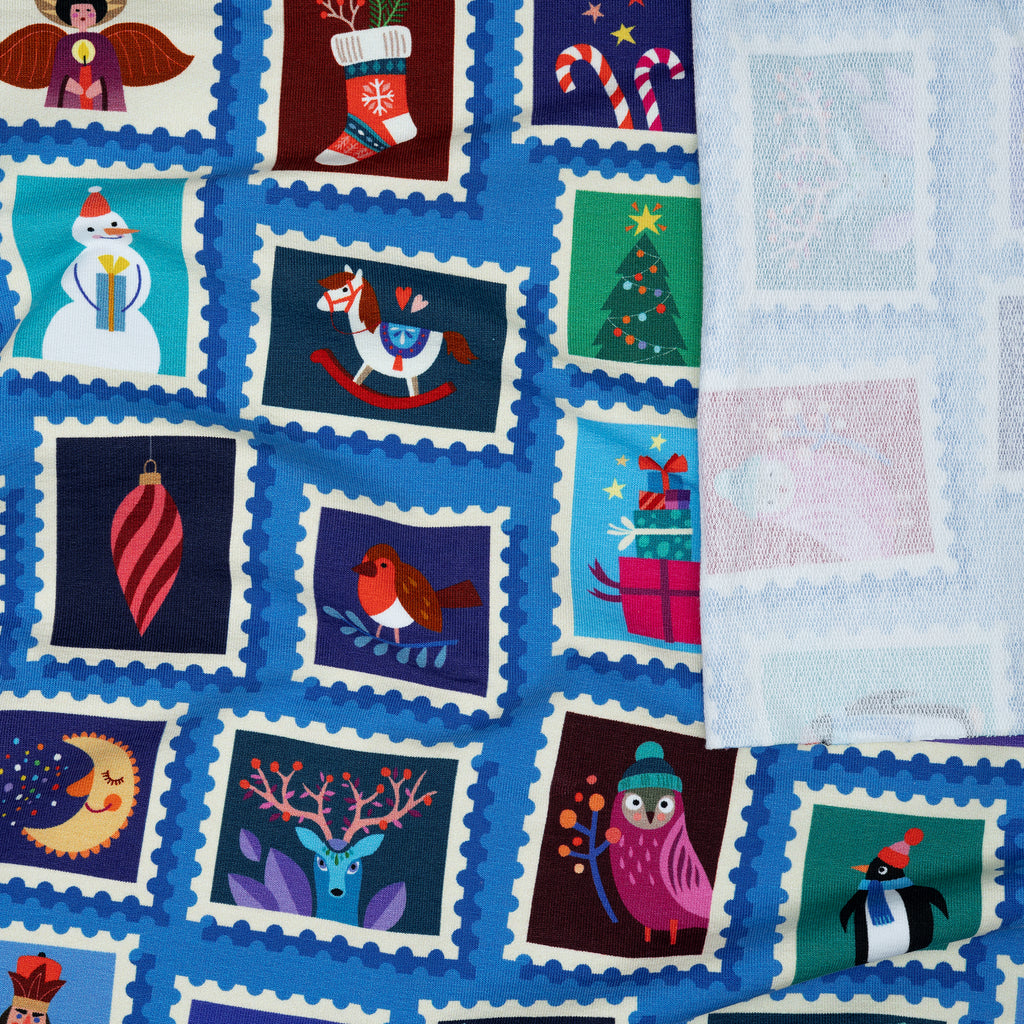 Bio French Terry Hamburger Liebe Christmas On Stamps Hellblau | Stoffwerk