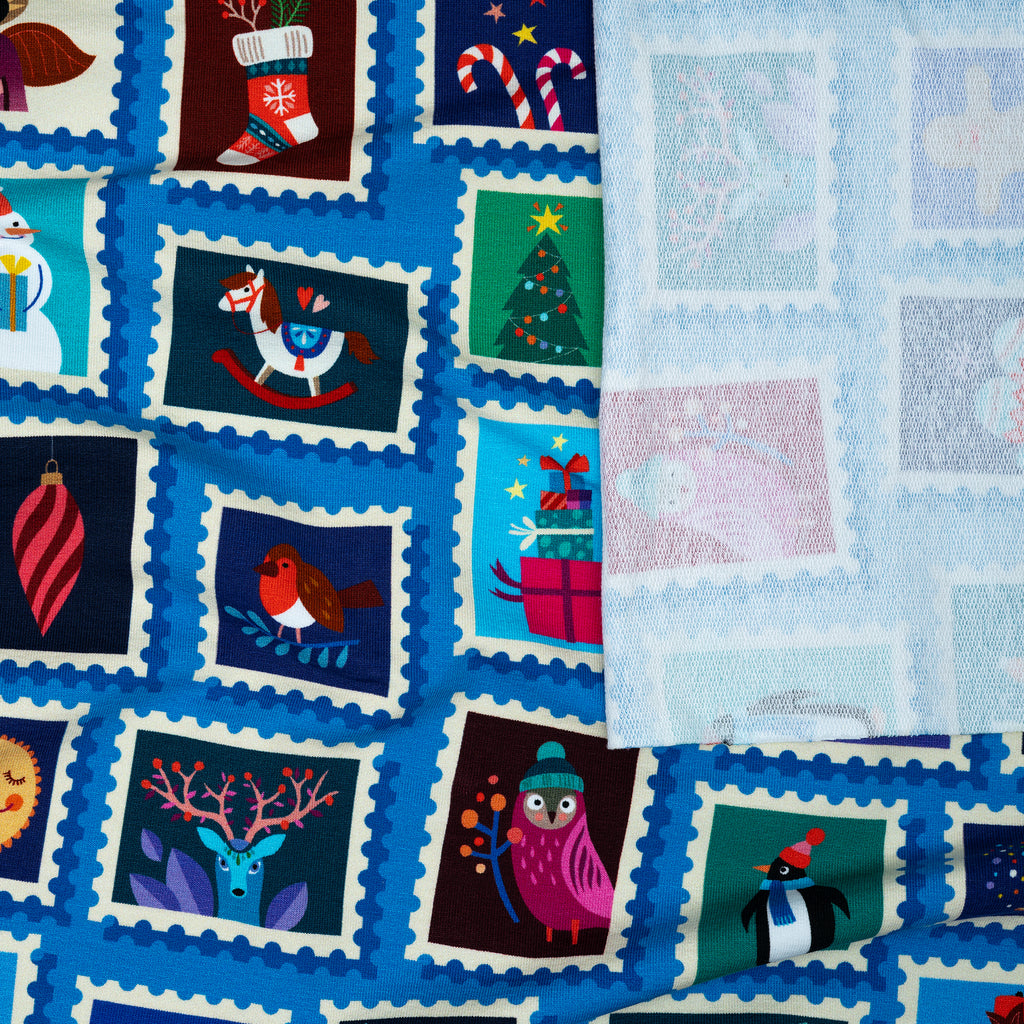 Bio French Terry Hamburger Liebe Christmas on Stamps Hellblau