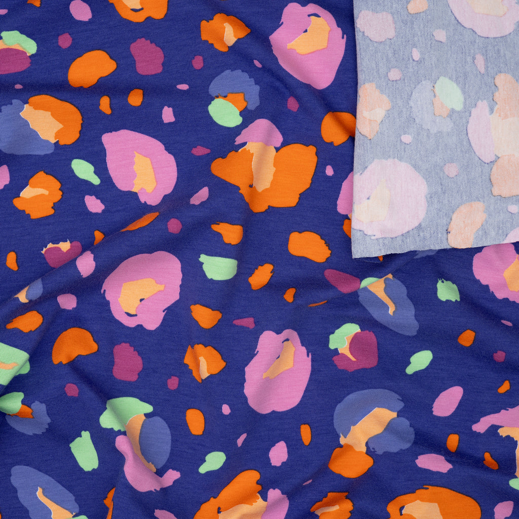 Bio Jersey Abstrakte Blumen Blau Orange Türkis | Stoffwerk