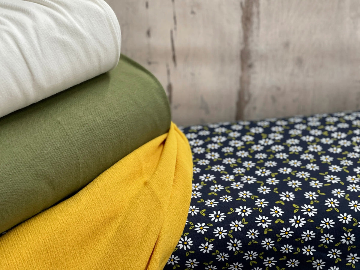 Bio Jersey Gänseblümchen Dunkelblau | Stoffwerk