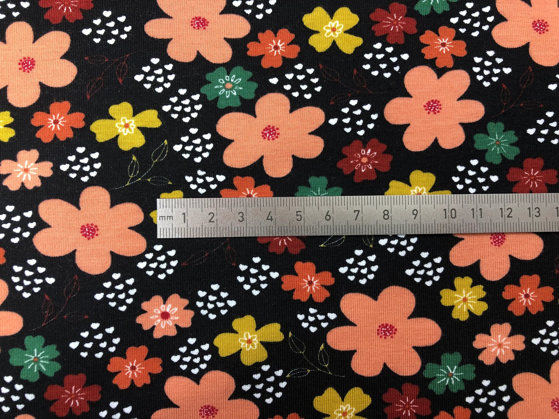 Bio Jersey schwarz Blume lachsrosa rost