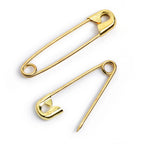 Sicherheitsnadeln goldfarbig